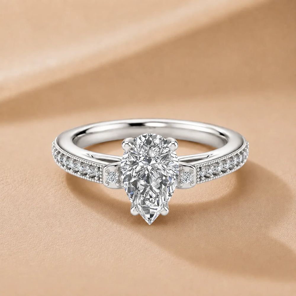 Vintage-Inspired Solitaire Ring with Accent Stone Details
