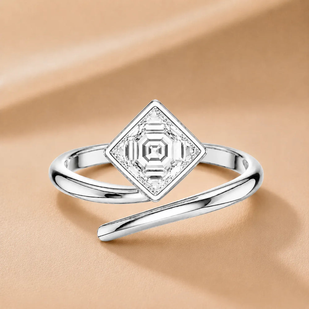 Elegant Pear-Cut Bezel Wrap Diamond Ring