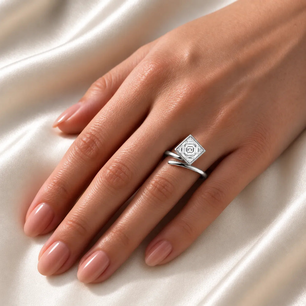 Elegant Pear-Cut Bezel Wrap Diamond Ring