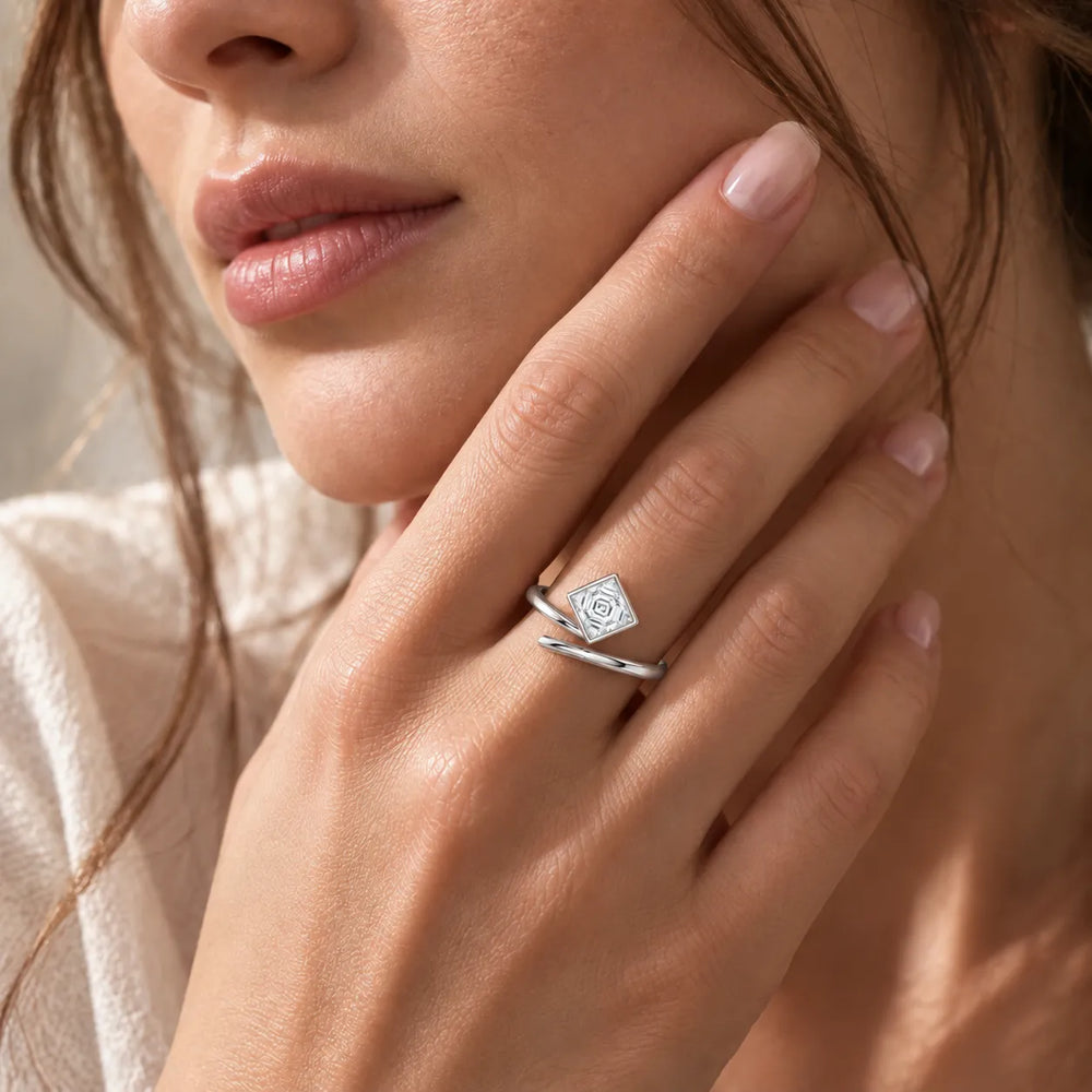 Elegant Pear-Cut Bezel Wrap Diamond Ring