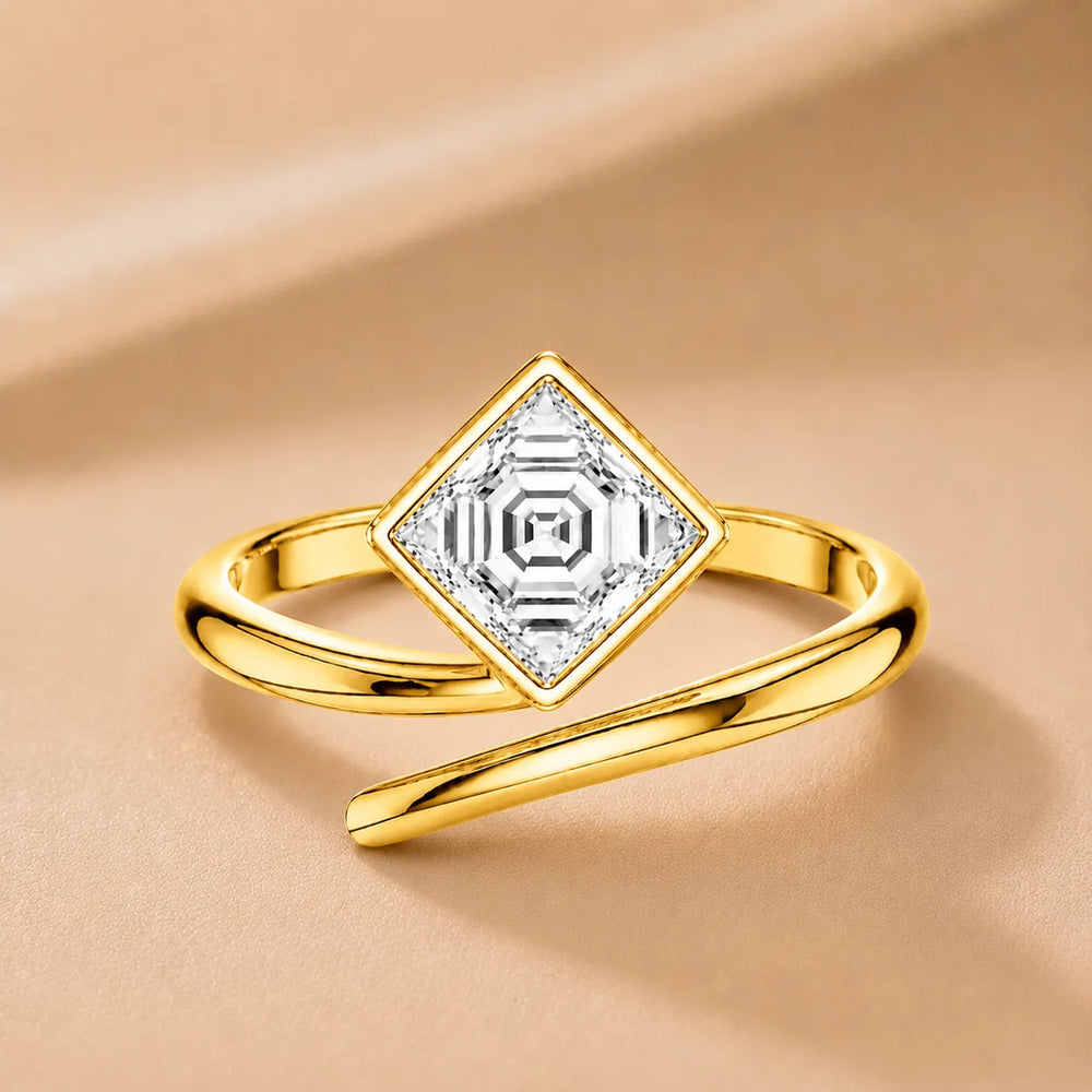 Elegant Pear-Cut Bezel Wrap Diamond Ring