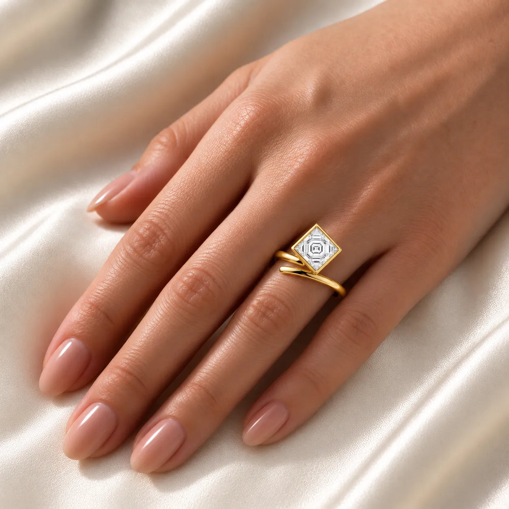 Elegant Pear-Cut Bezel Wrap Diamond Ring