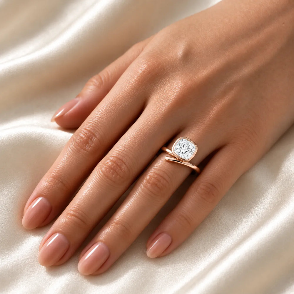 Elegant Pear-Cut Bezel Wrap Diamond Ring