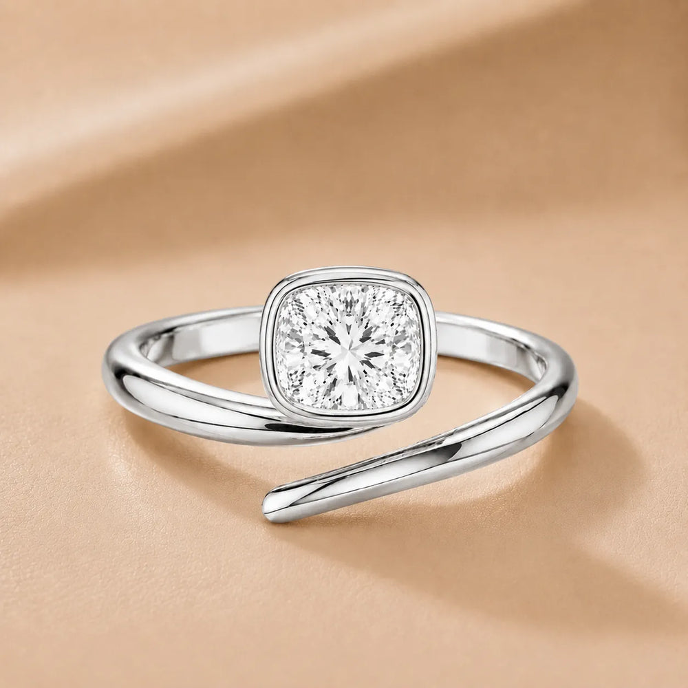 Elegant Pear-Cut Bezel Wrap Diamond Ring