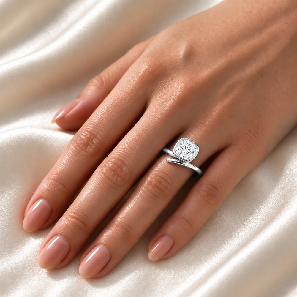 Elegant Pear-Cut Bezel Wrap Diamond Ring