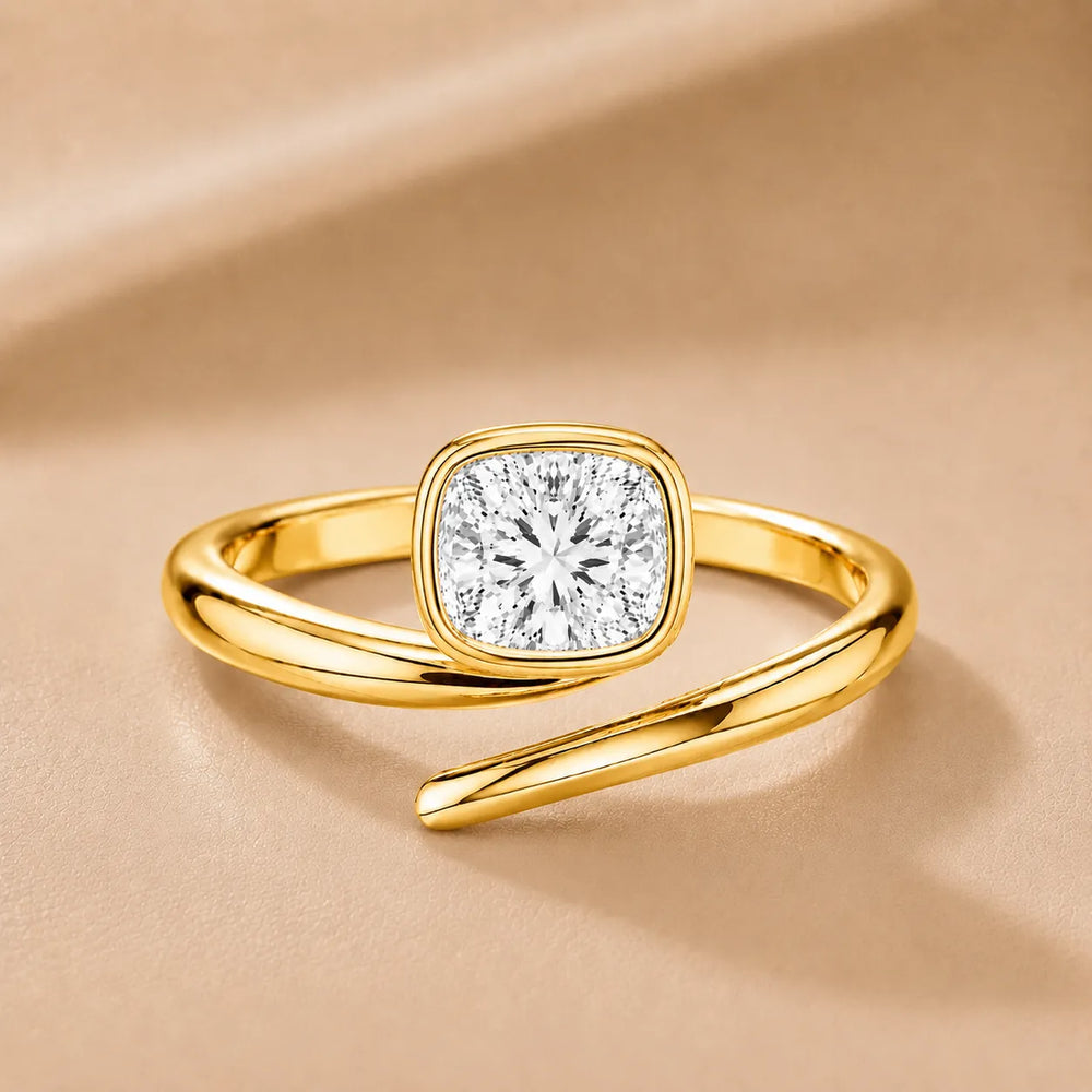 Elegant Pear-Cut Bezel Wrap Diamond Ring