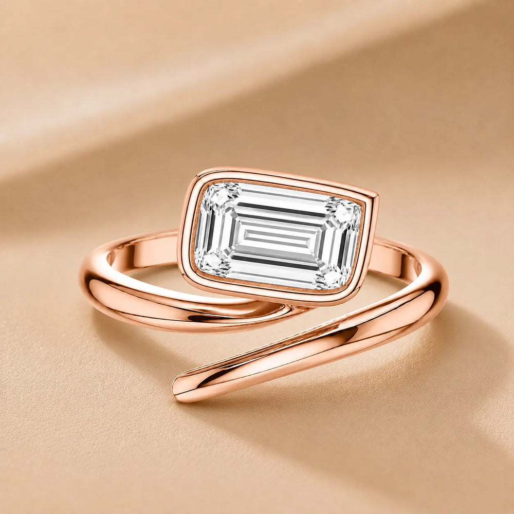 Elegant Pear-Cut Bezel Wrap Diamond Ring