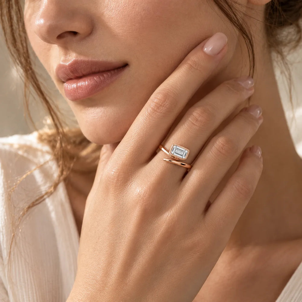 Elegant Pear-Cut Bezel Wrap Diamond Ring