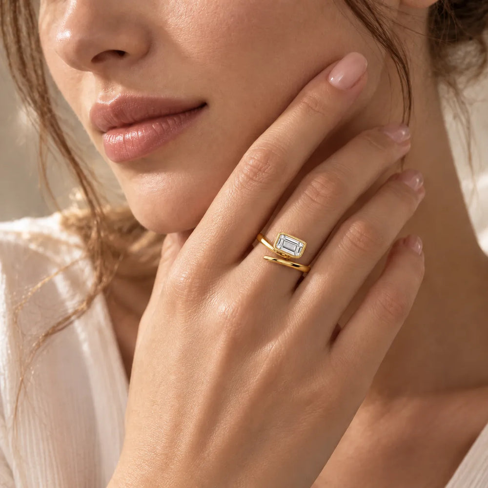 Elegant Pear-Cut Bezel Wrap Diamond Ring