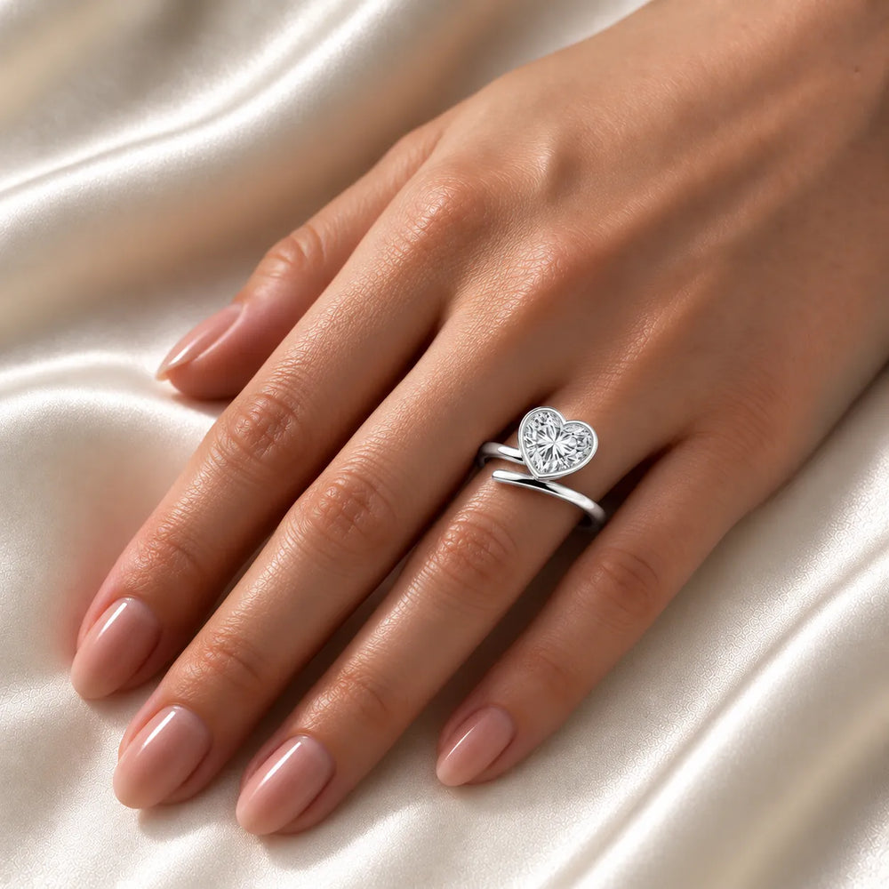 Elegant Pear-Cut Bezel Wrap Diamond Ring