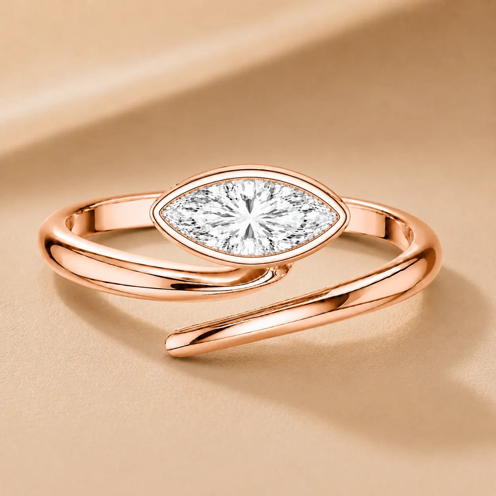 Elegant Pear-Cut Bezel Wrap Diamond Ring