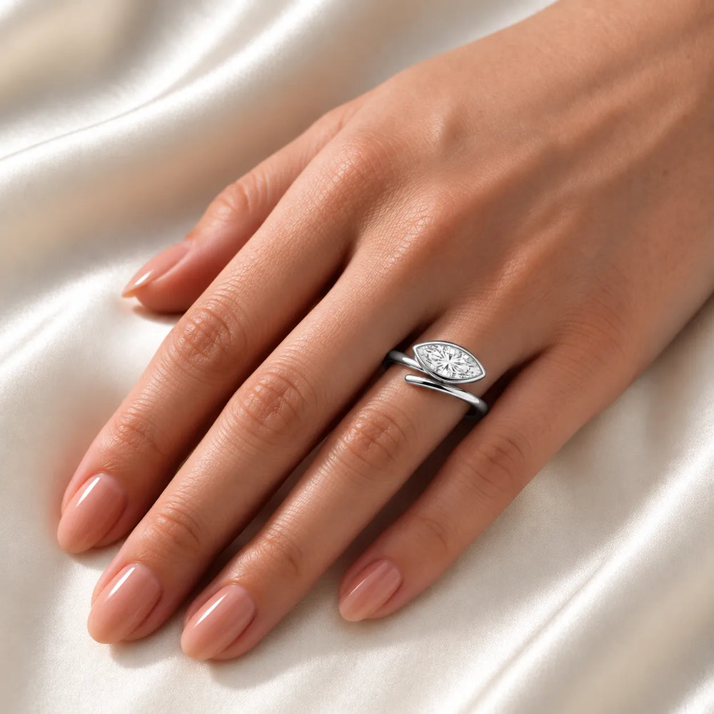Elegant Pear-Cut Bezel Wrap Diamond Ring