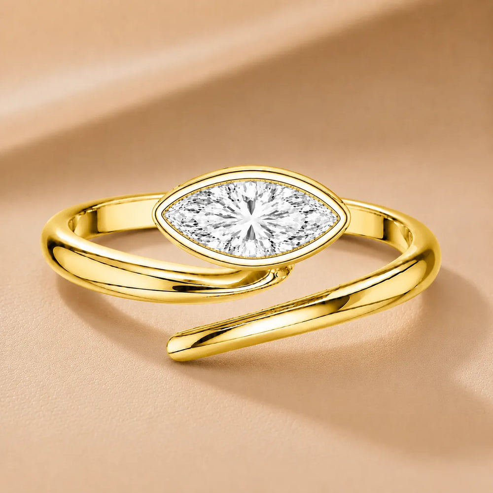 Elegant Pear-Cut Bezel Wrap Diamond Ring
