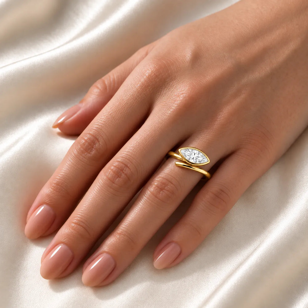 Elegant Pear-Cut Bezel Wrap Diamond Ring