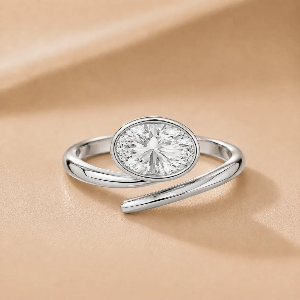 Elegant Pear-Cut Bezel Wrap Diamond Ring