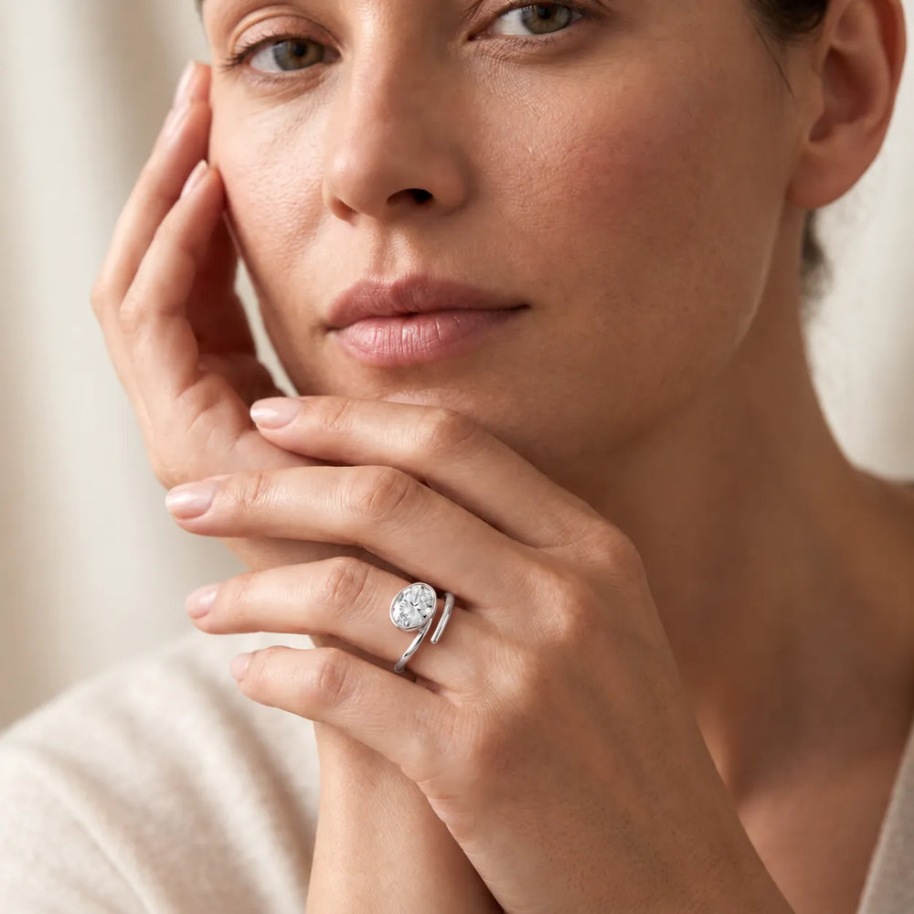 Elegant Pear-Cut Bezel Wrap Diamond Ring
