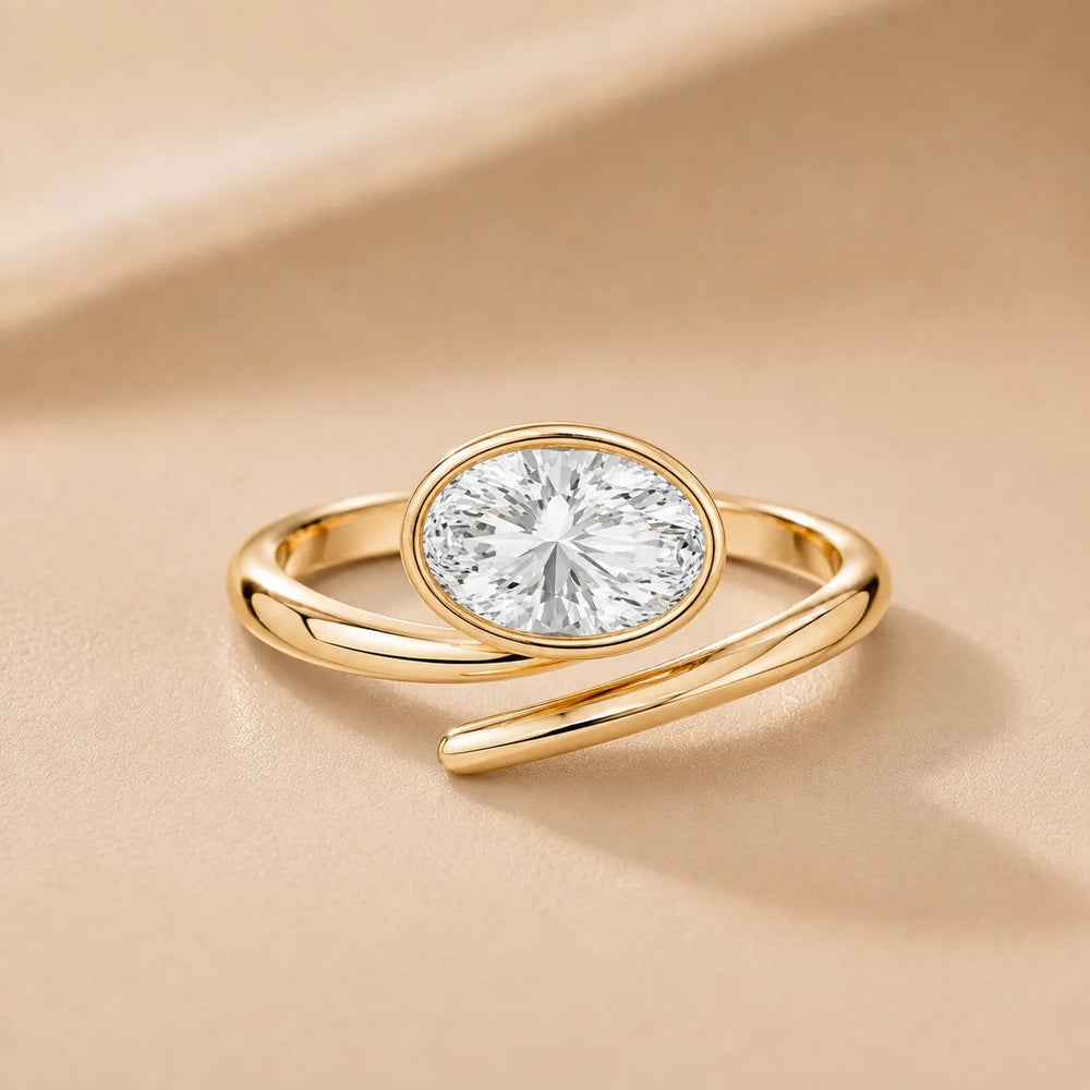 Elegant Pear-Cut Bezel Wrap Diamond Ring