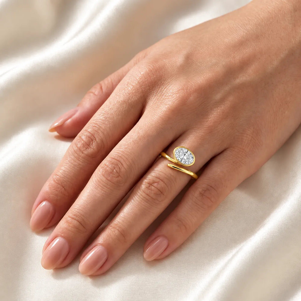 Elegant Pear-Cut Bezel Wrap Diamond Ring