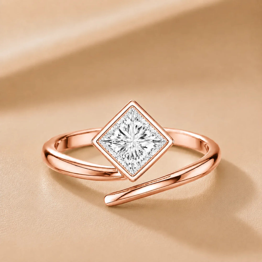 Elegant Pear-Cut Bezel Wrap Diamond Ring