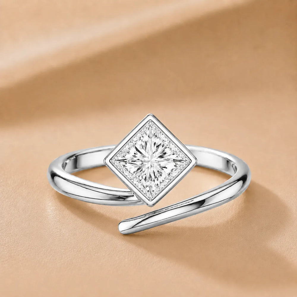 Elegant Pear-Cut Bezel Wrap Diamond Ring