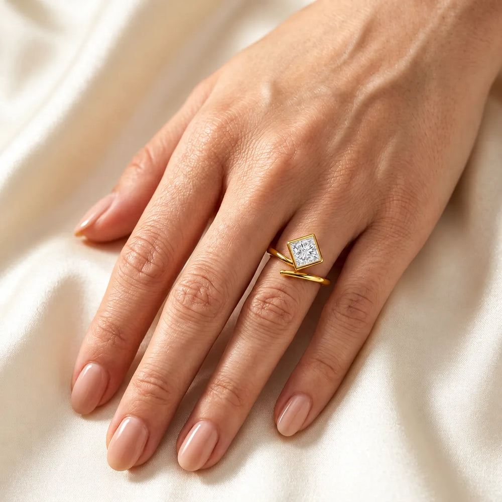 Elegant Pear-Cut Bezel Wrap Diamond Ring