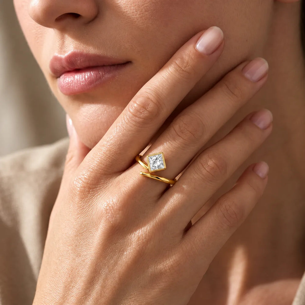 Elegant Pear-Cut Bezel Wrap Diamond Ring