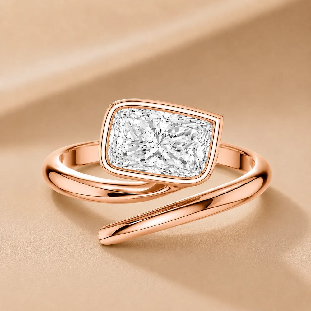 Elegant Pear-Cut Bezel Wrap Diamond Ring