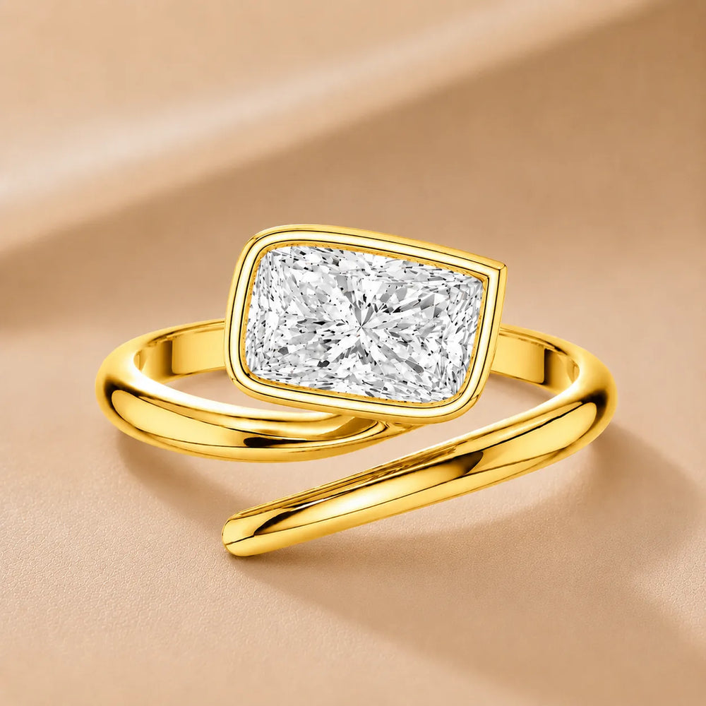 Elegant Pear-Cut Bezel Wrap Diamond Ring