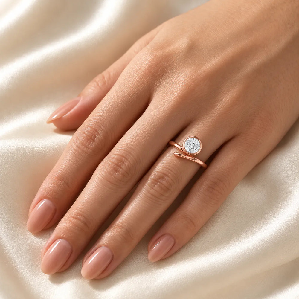Elegant Pear-Cut Bezel Wrap Diamond Ring