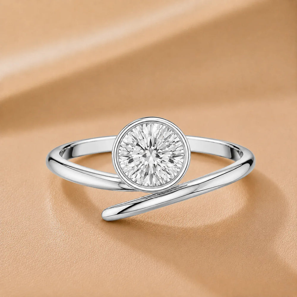 Elegant Pear-Cut Bezel Wrap Diamond Ring
