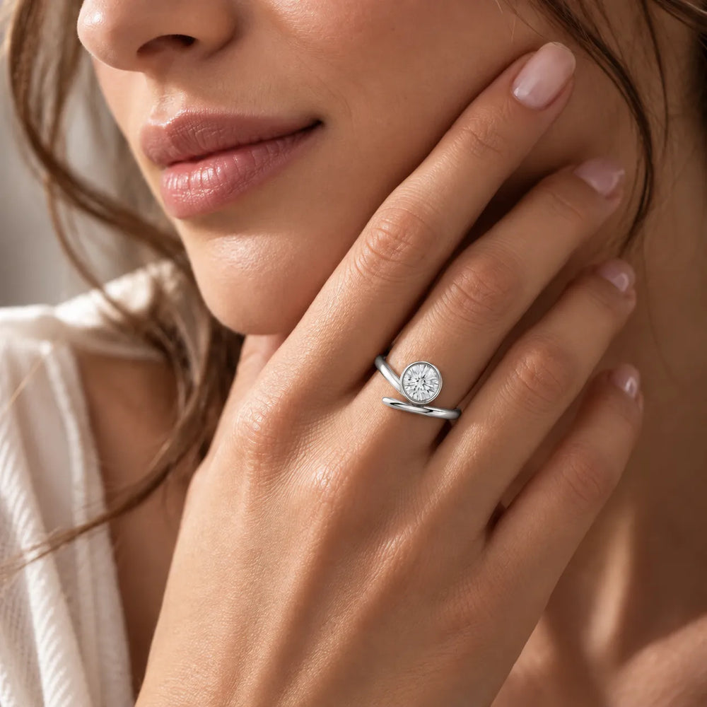 Elegant Pear-Cut Bezel Wrap Diamond Ring