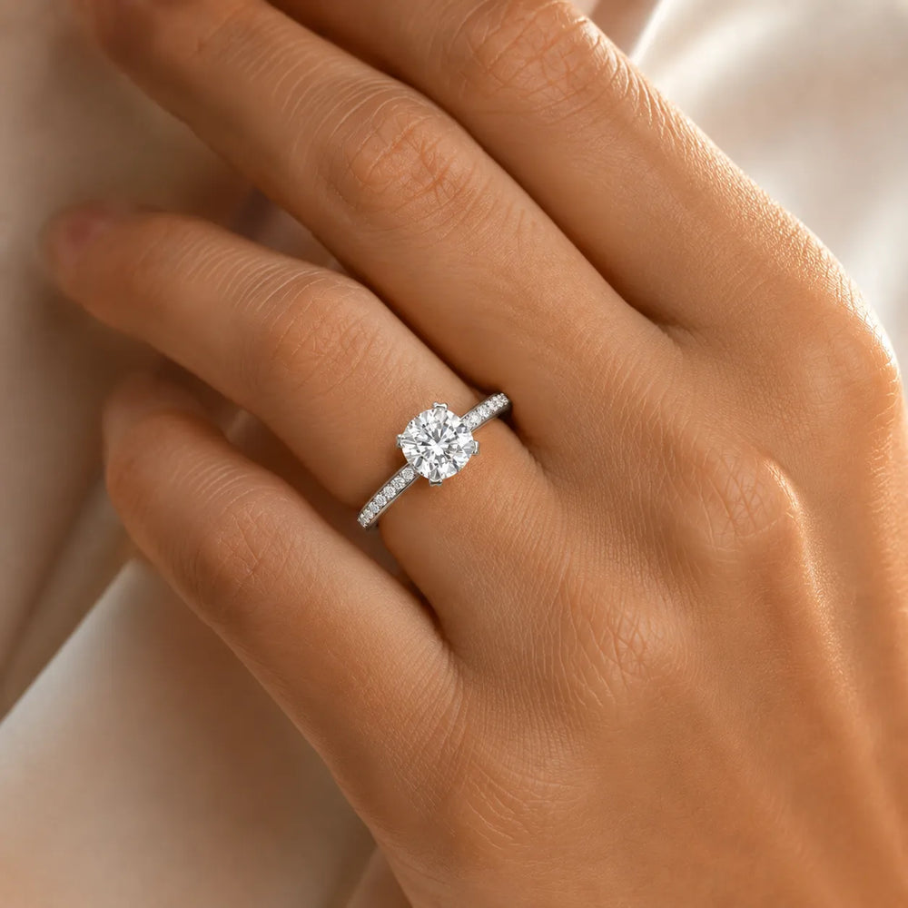 Classic Solitaire Ring with Channel-Set Accent Stones