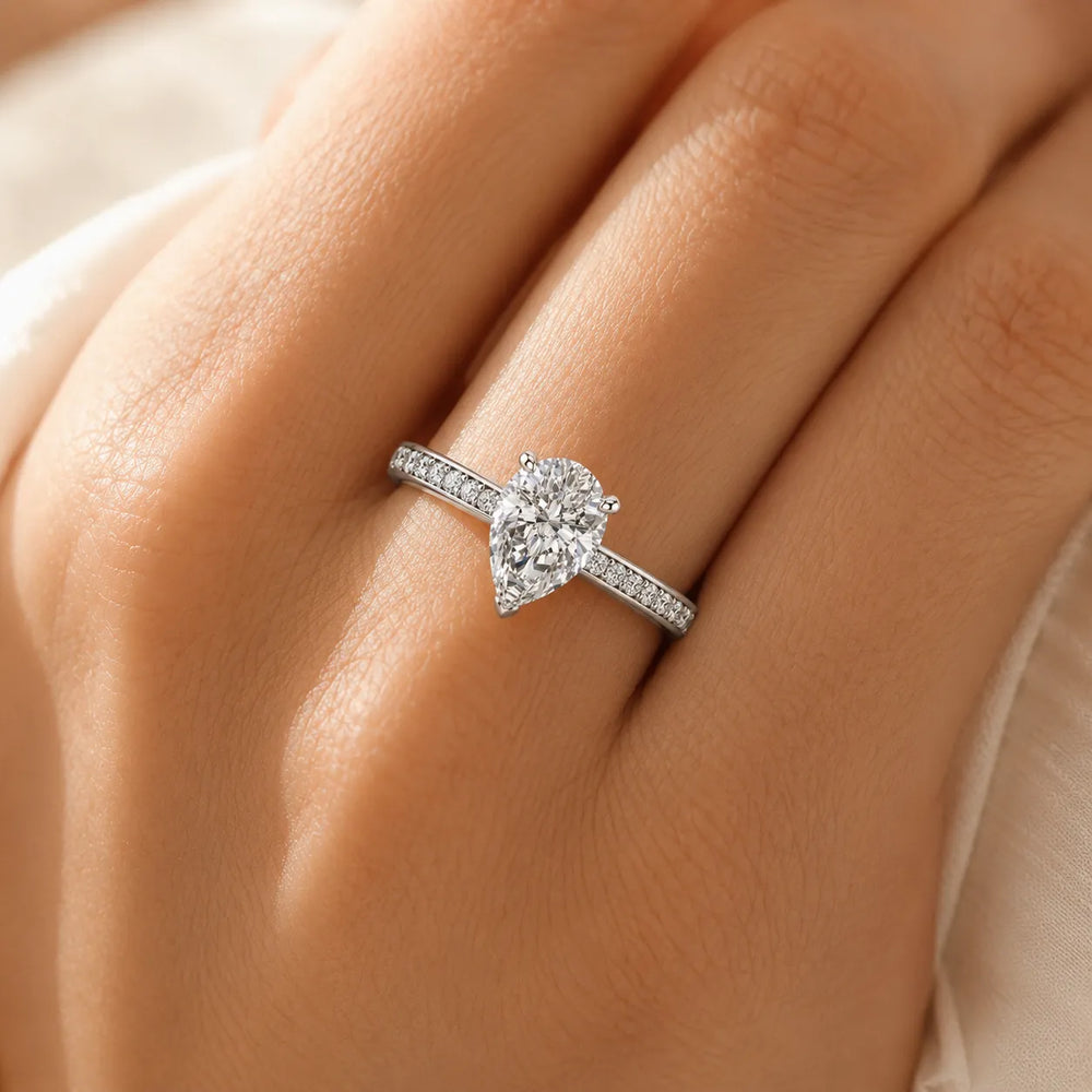 Classic Solitaire Ring with Channel-Set Accent Stones