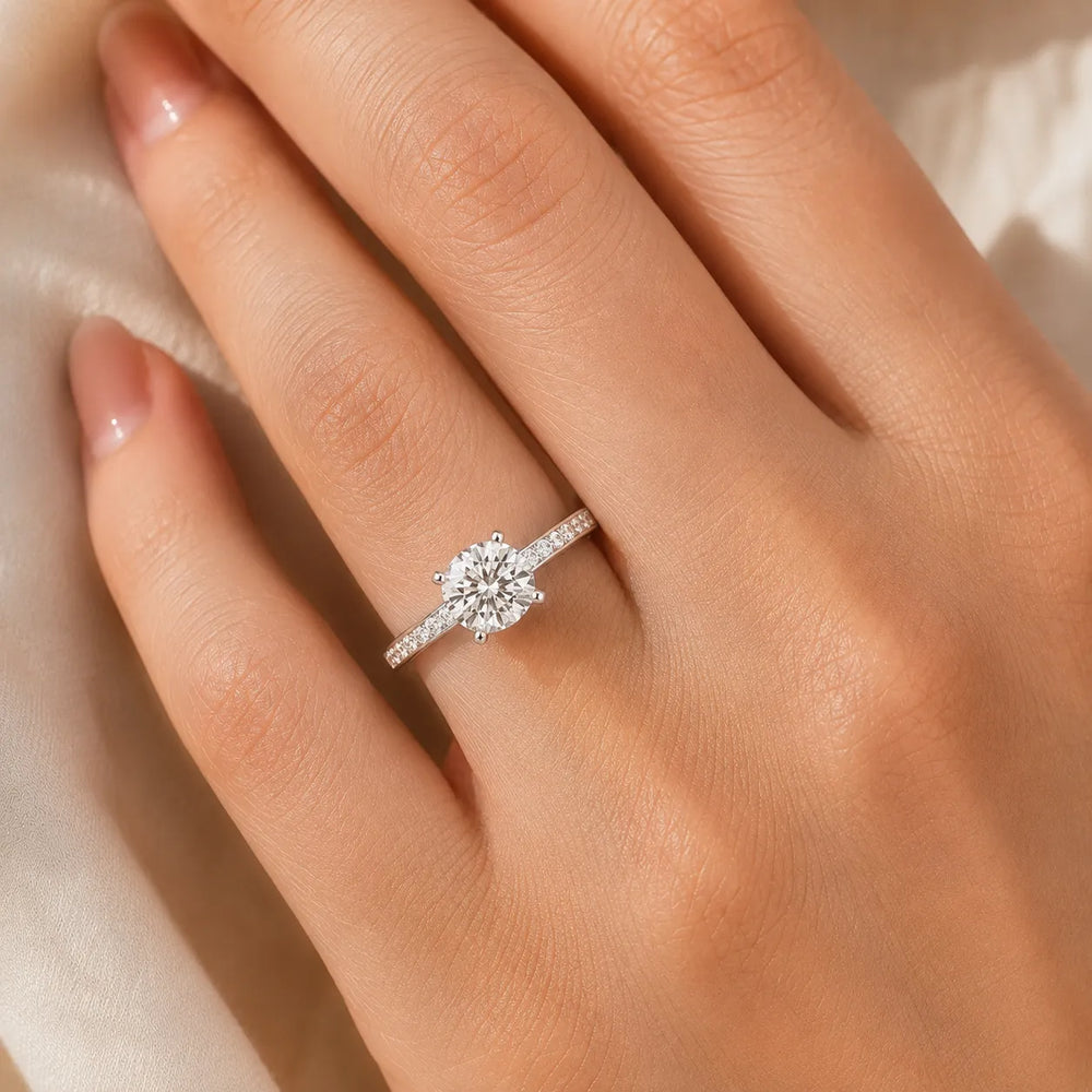 Classic Solitaire Ring with Channel-Set Accent Stones