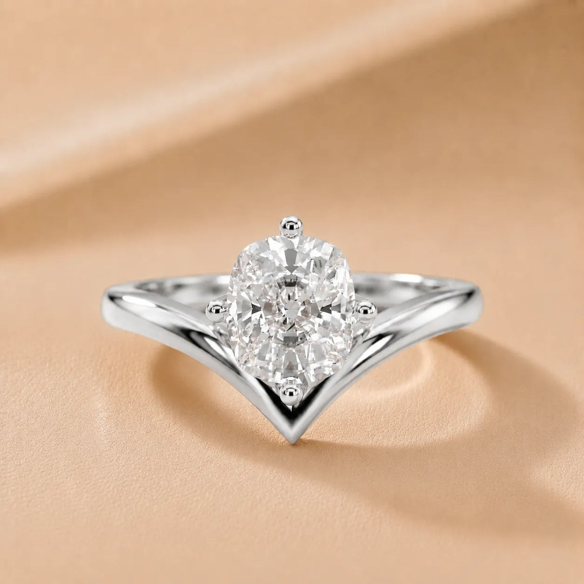 Evelyn Chevron Solitaire Round Diamond Engagement Ring