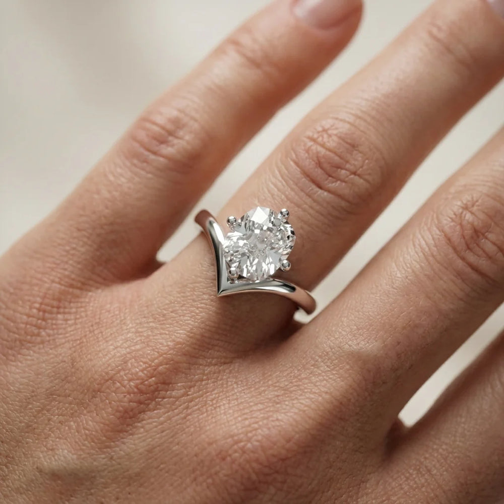 Evelyn Chevron Solitaire Round Diamond Engagement Ring