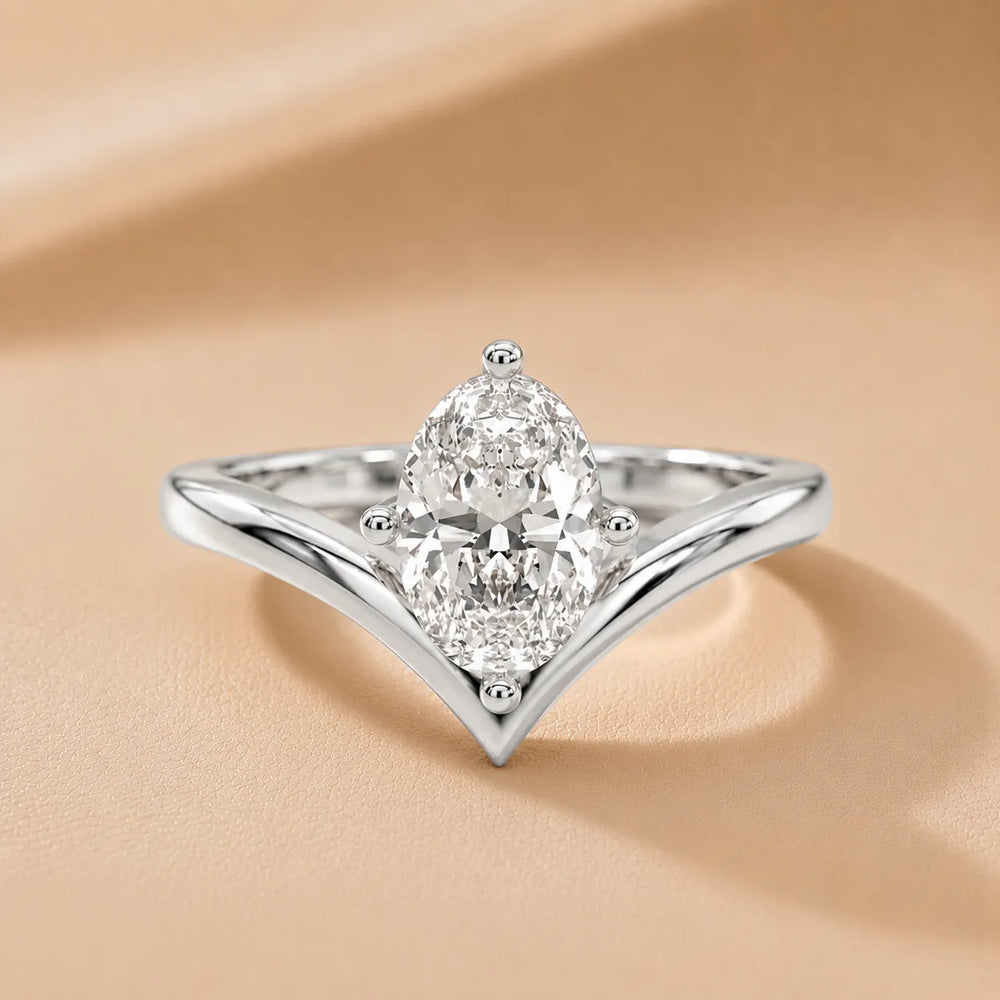Evelyn Chevron Solitaire Round Diamond Engagement Ring
