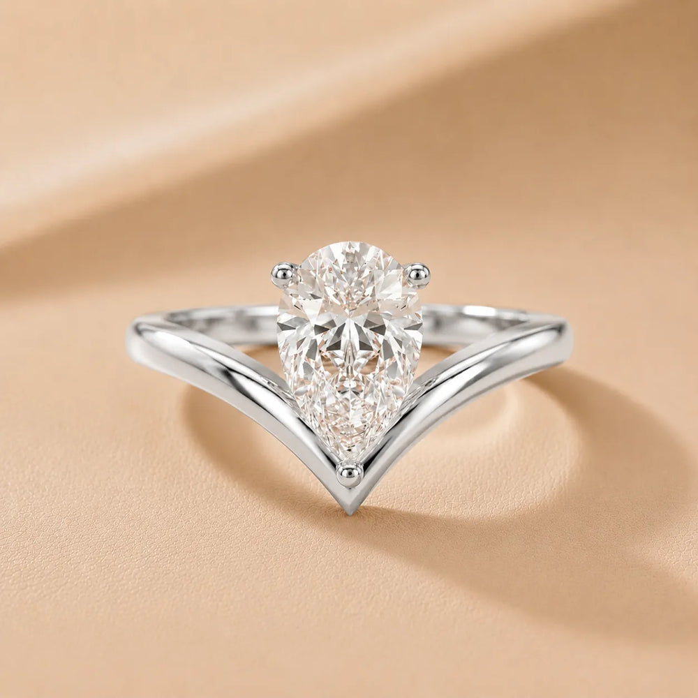 Evelyn Chevron Solitaire Round Diamond Engagement Ring