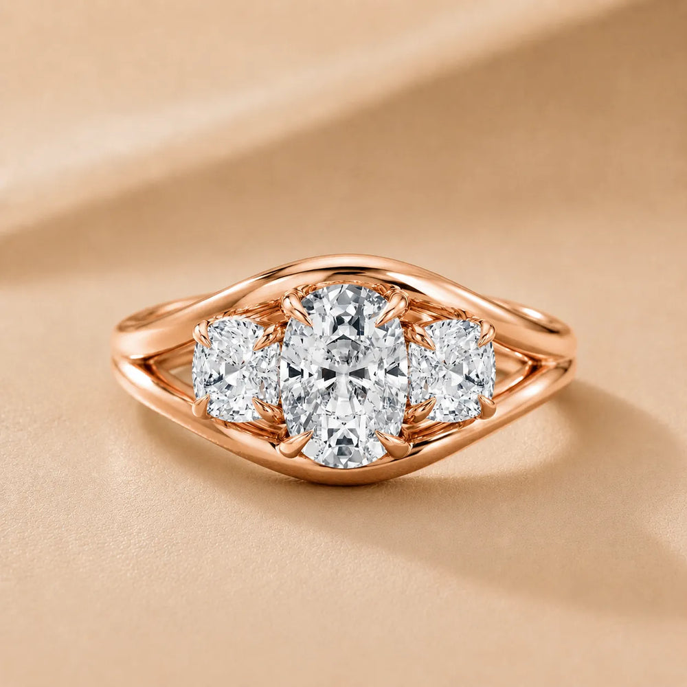 Exquisite Three-Stone Oval Diamond Engagement Ring