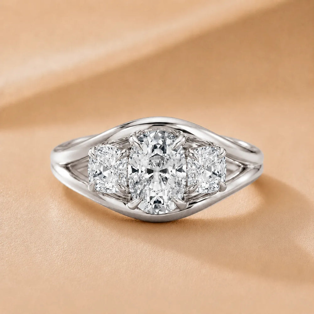 Exquisite Three-Stone Oval Diamond Engagement Ring