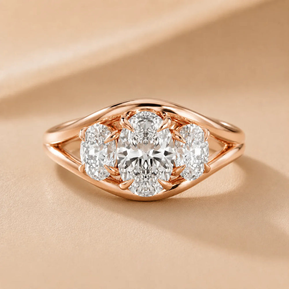 Exquisite Three-Stone Oval Diamond Engagement Ring