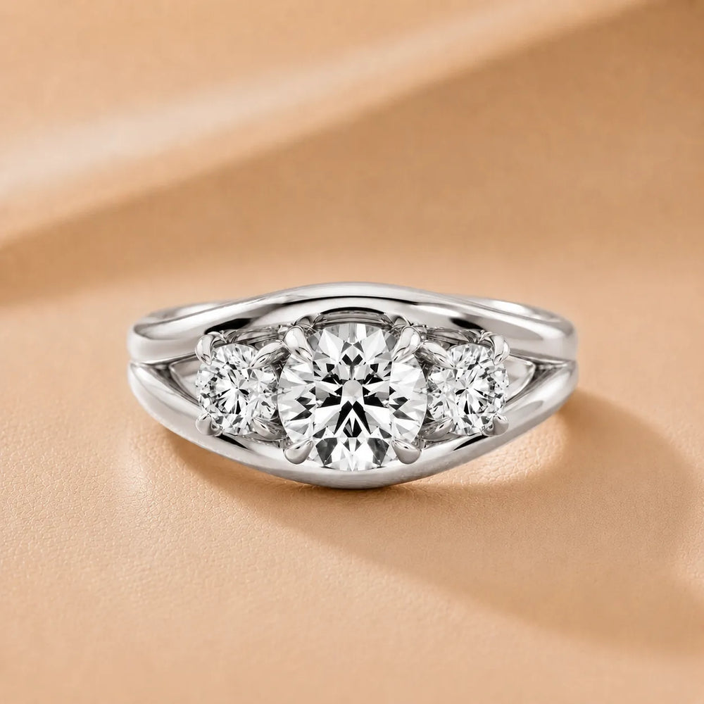 Exquisite Three-Stone Oval Diamond Engagement Ring