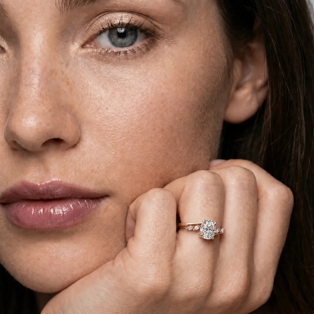 Flora Twist Side Stone Oval Diamond Engagement Ring