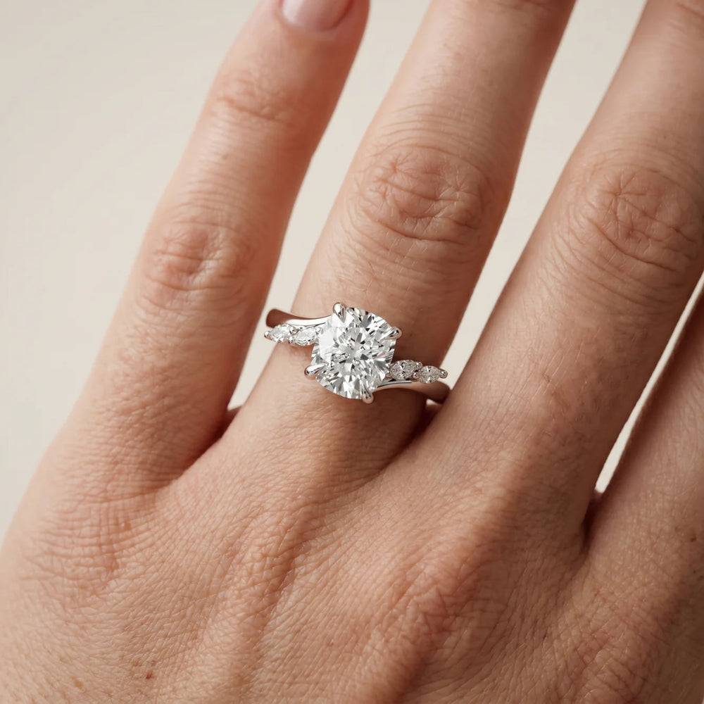 Flora Twist Side Stone Oval Diamond Engagement Ring