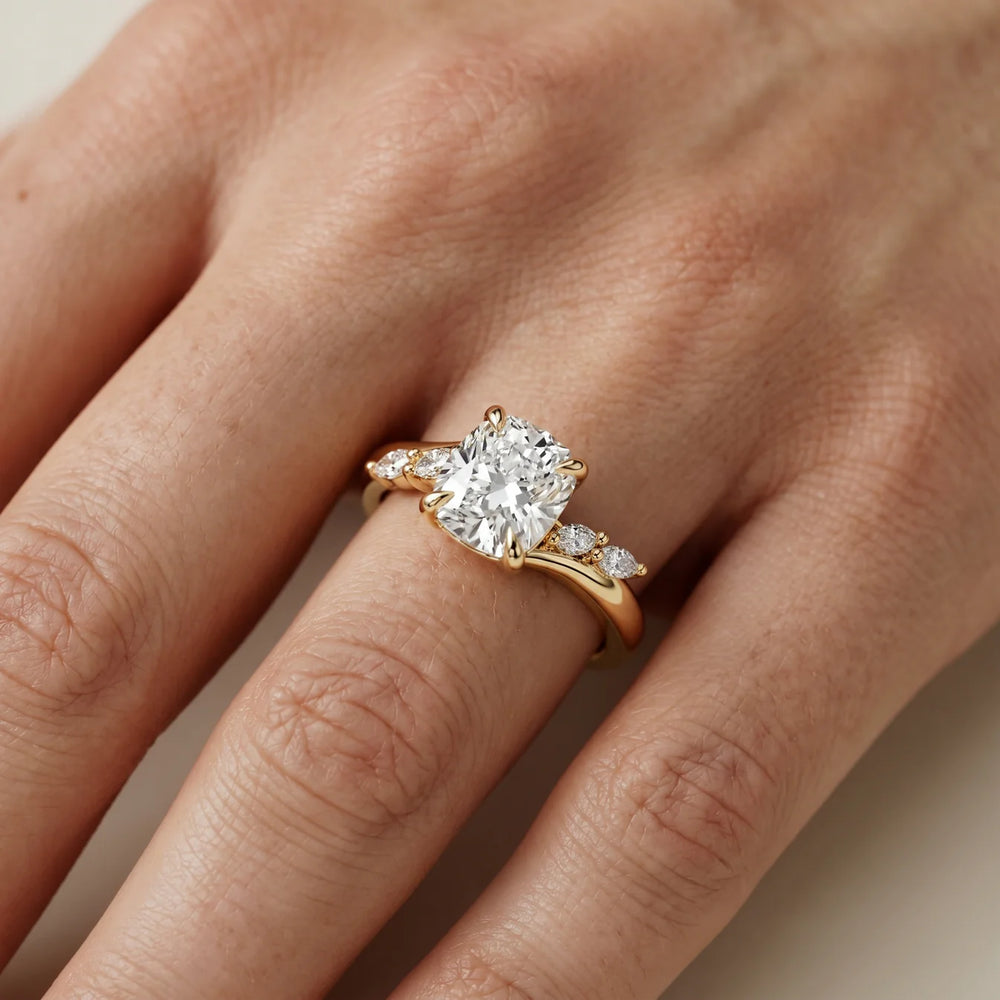 Flora Twist Side Stone Oval Diamond Engagement Ring