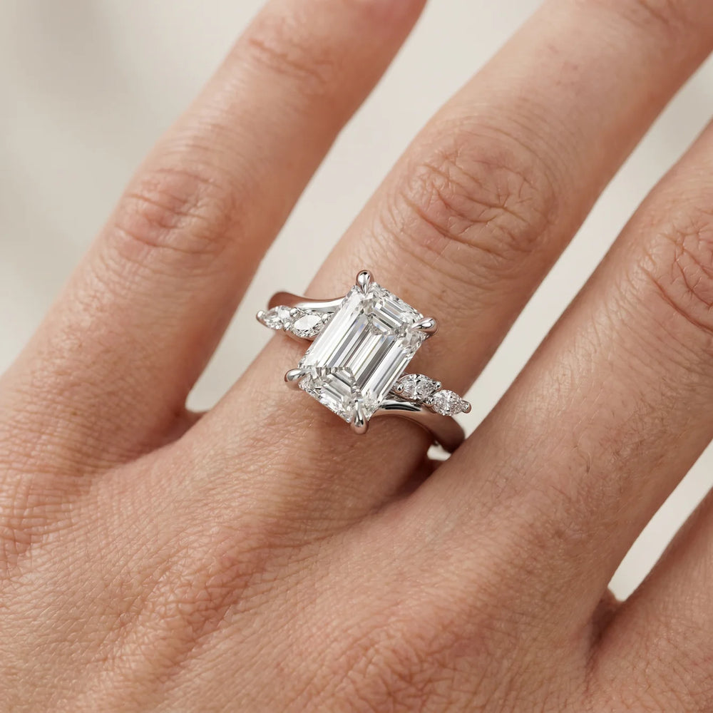 Flora Twist Side Stone Oval Diamond Engagement Ring