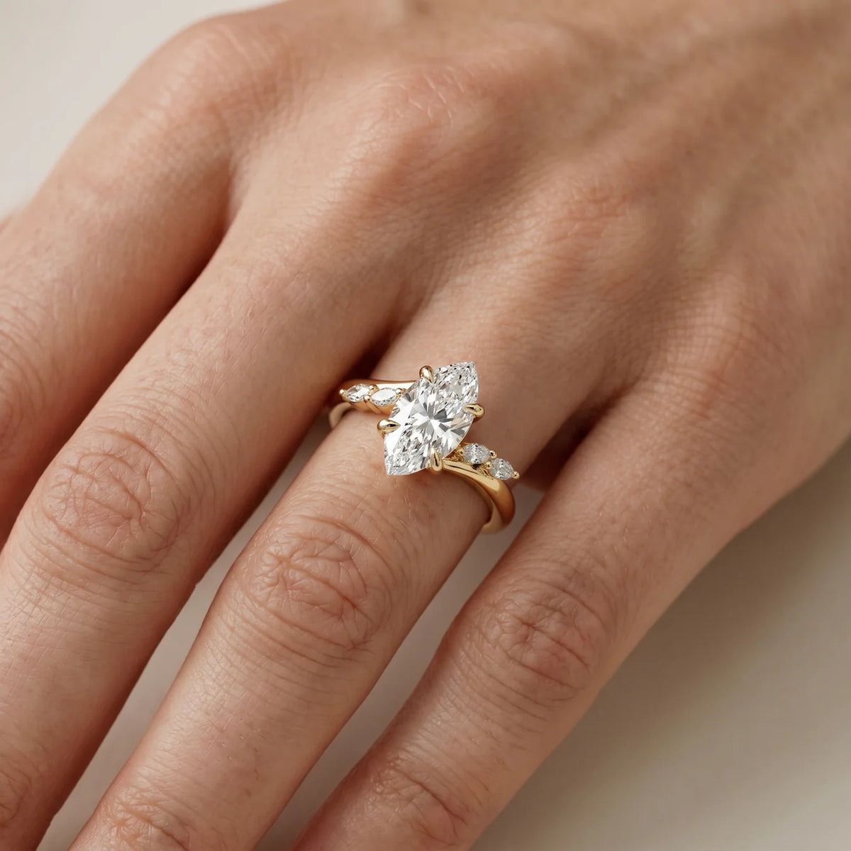 Flora Twist Side Stone Oval Diamond Engagement Ring
