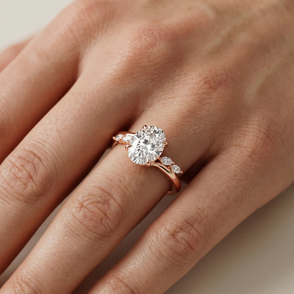 Flora Twist Side Stone Oval Diamond Engagement Ring