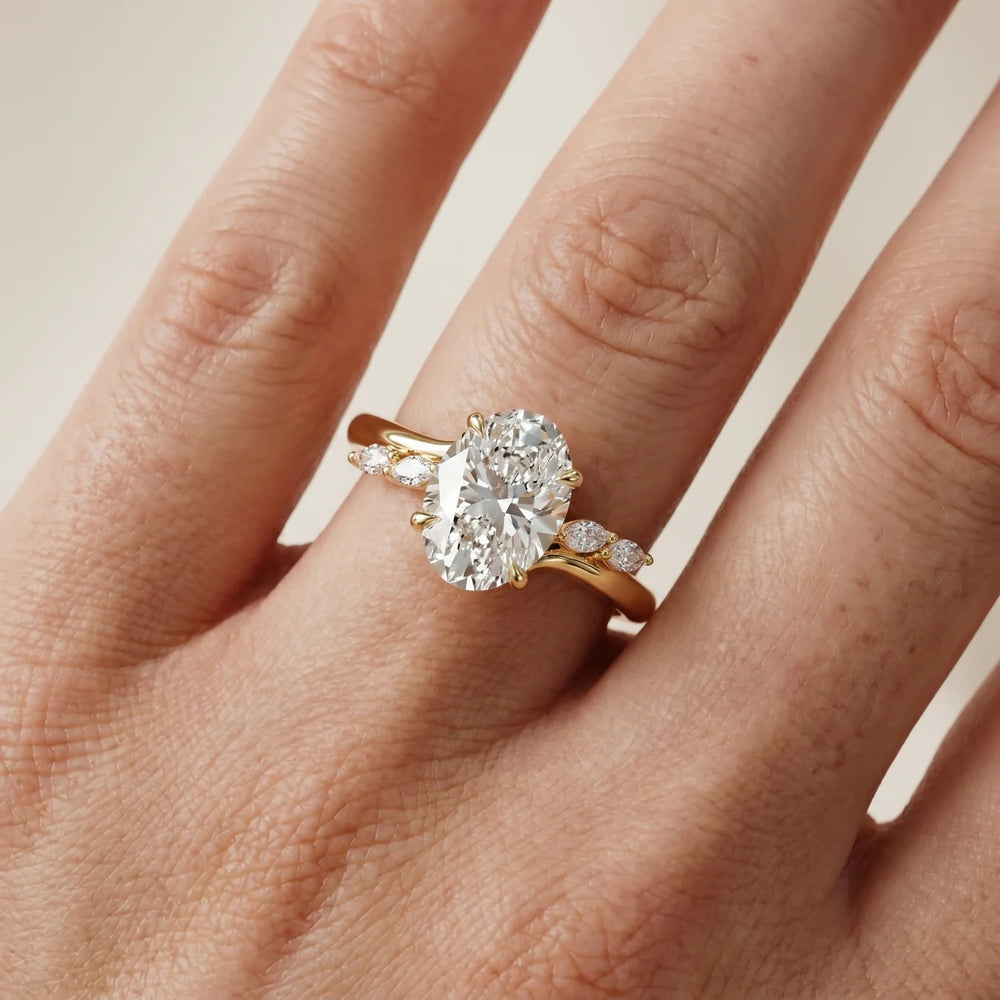 Flora Twist Side Stone Oval Diamond Engagement Ring