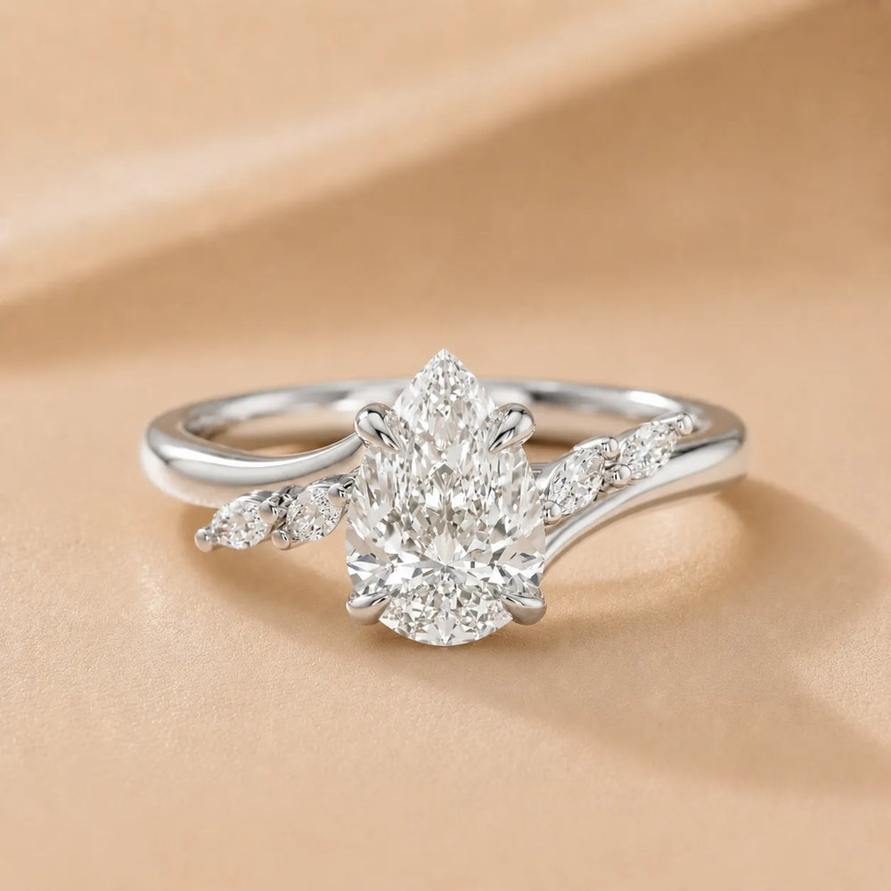 Flora Twist Side Stone Oval Diamond Engagement Ring